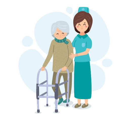 پرستار خانم در حال کمک به یک سالمند خانم با واکر برای راه رفتن ایمن در منزل